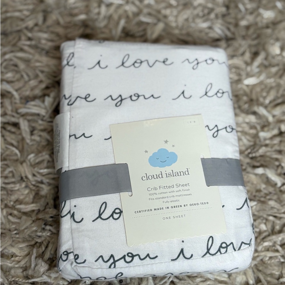 cloud island White Crib Sheet with Black Script "I love you"
